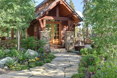 Aspen and flower lined entry way.