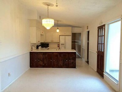 Dining Room. Open dining and kitchen area