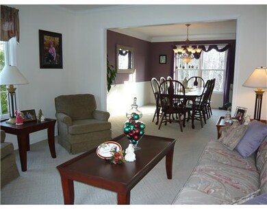 Living Room. Formal room adjacent to dining room which allows for overflow during large gatherings.