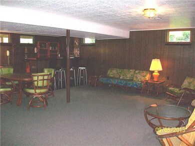 Basement/Game Room. fireplace, wet bar, and new ca
