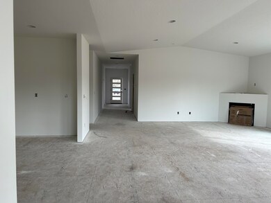 Great room to hall, door & kitchen view