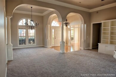 Beautiful entryway with hardwood floors.  Open liv