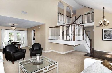 Living room - views toward dining room and stairca