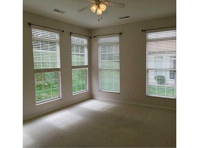 Sunroom. Light and bright (though all window blind