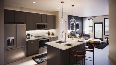 Kitchen featuring stainless steel appliances, back