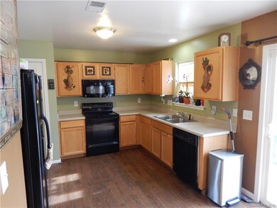 Kitchen with window over the sink to view the back