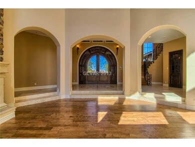 Entry Hall. Formal living, entry foyer, wine cella