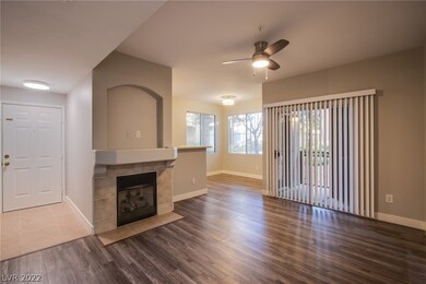 Breakfast Bar to Right of Fireplace Leads to Dinin