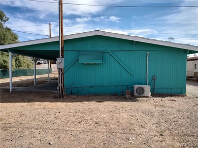 New power pole and split AC/heating unit on the re