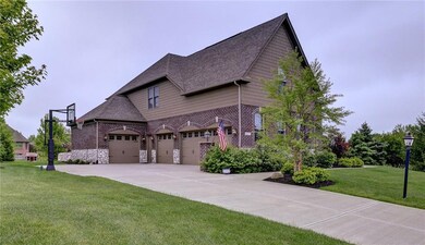 4 car garage.  Garage features 1/2 bathroom with utility sink.  4th garage features garage door to back patio and yard.