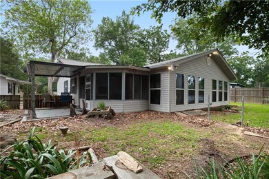 Screened porch and patio on rear of main house