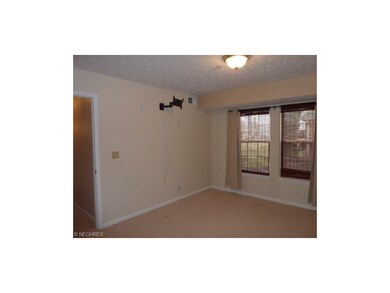 Main bedroom with walk-in closet and access to mai