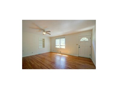 Living Room with Beautiful Hardwood Floors!