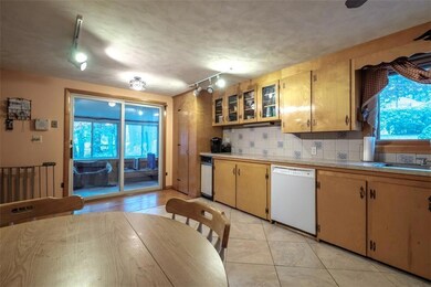 Slider to Sun Room off of Kitchen