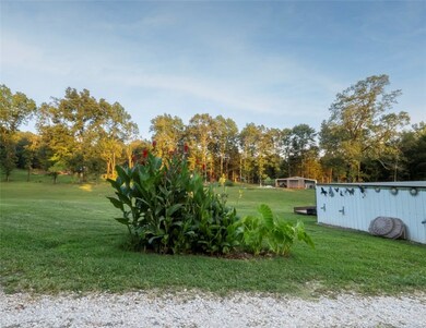 Landscaping, well tended lawn and usable land!