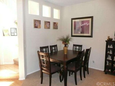 Formal living and dining rooms compliment this ope