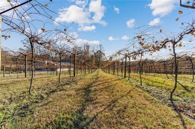 Three Strands Vineyard and Winery is just a 2 minute drive away