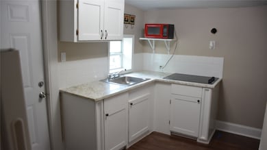 This apartment comes with stove, refrigerator and