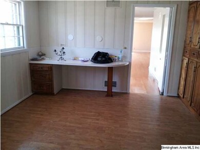 Kitchen eating area with built-in bar area
