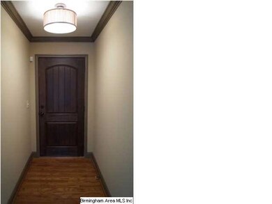 Foyer with hardwood floor
