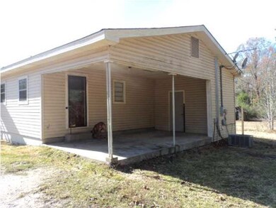 Right side of the house and carport