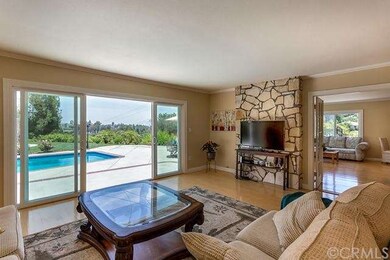 Another view of the formal living room with views 