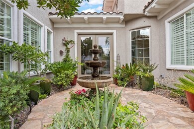 Lovely courtyard with fountain and French doors th