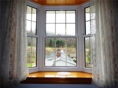 Bay window with a view of the mountain.