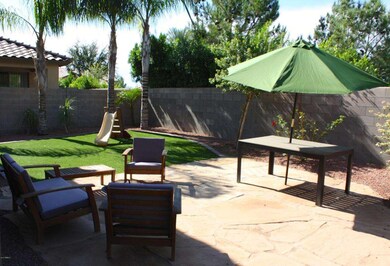 EXTENDED PATIO & GRASSY AREA
