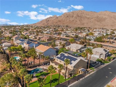 Aerial perspective of suburban area with a mountai