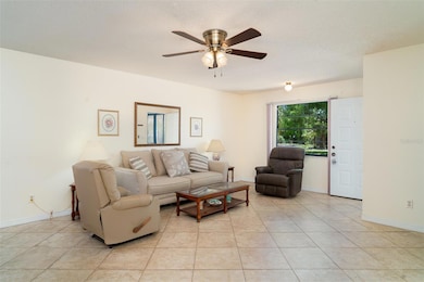 Spacious living room area with ceramic tile