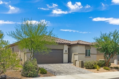 View of front of property with an attached garage,
