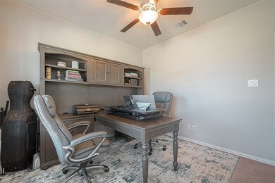 Currently being used as study this is the second bedroom downstairs.