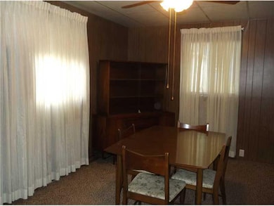Dining Room. The formal dining room has two window