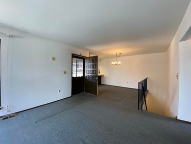 07 View of front door and dining