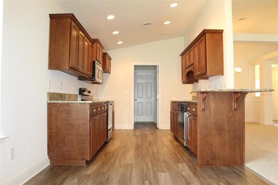 Beautiful Kitchen with Granite Counter Tops