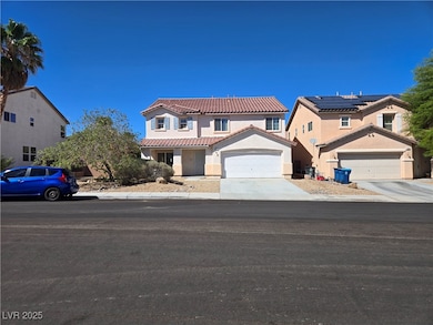 Mediterranean / spanish-style home with driveway, stucco siding, a tiled roof, and an attached garage