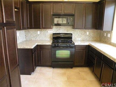 SAMPLE kitchen of one of the completed homes in th