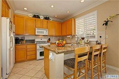 Kitchen, spacious travertine counter and breakfast
