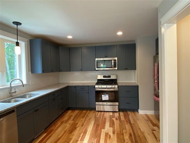 13 Clover Ln unit Lot 86, Londonderry, NH 03053 - photo 4