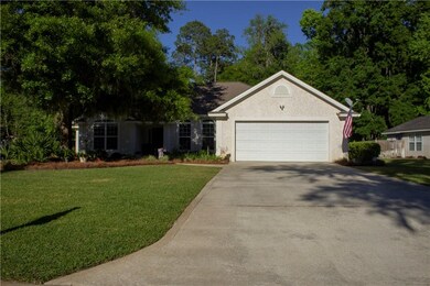 Enjoy the beautifully landscaped front lawn of thi