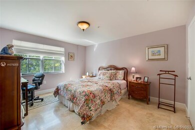 SECOND BEDROOM WITH CUSTOM-BUILT WALK-IN CLOSET