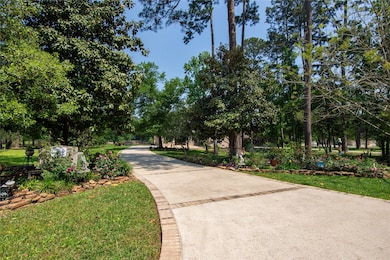 This photo showcases a charming brick home surroun