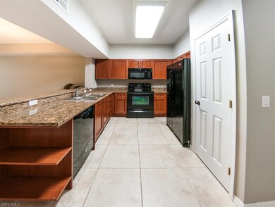 Granite counters and pantry to the right