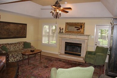 Coffered ceiling, plantation shutters, fireplace, 