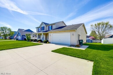 View of front of property with a front lawn