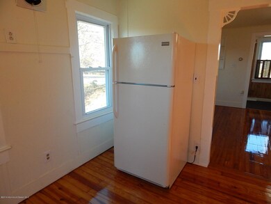 Sunny Eat-In Kitchen with New Appliances