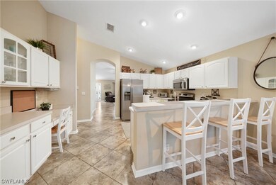 Open Kitchen with breakfast bar and work station.