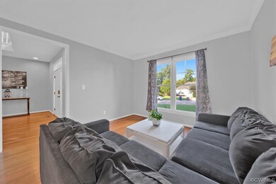 Living room with hardwood flooring