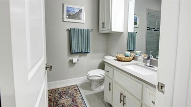 Full bath on 1st floor for bedroom/home office. Up